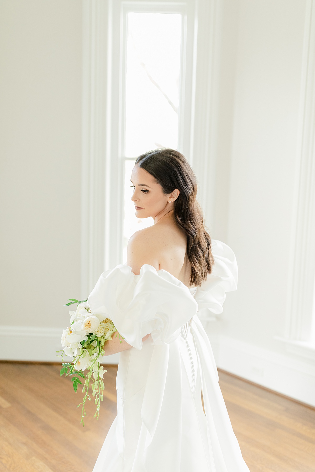 Mcalister Leftwich House bridals in white dress